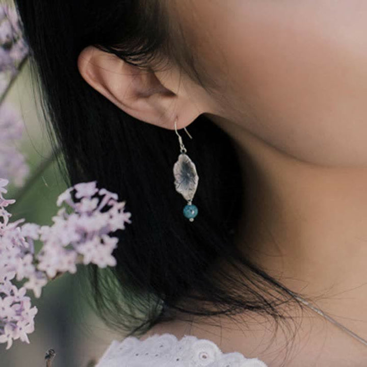 Orecchini pendenti con protezione a forma di foglia di loto turchese in argento sterling 925 Buddha Stones