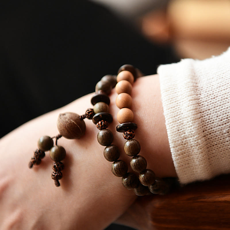 Bracciale Mala con ciondolo di protezione in legno di sandalo tibetano Buddha Stones