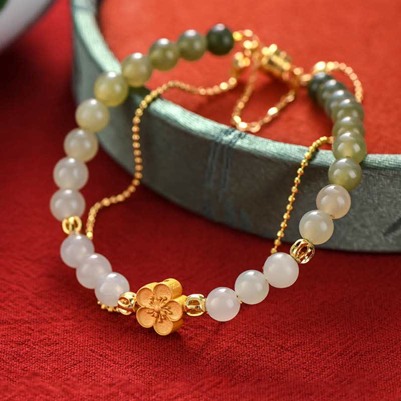 Bracciale Buddha Stones in argento sterling 925 con giada naturale Hetian e fiori di pesco