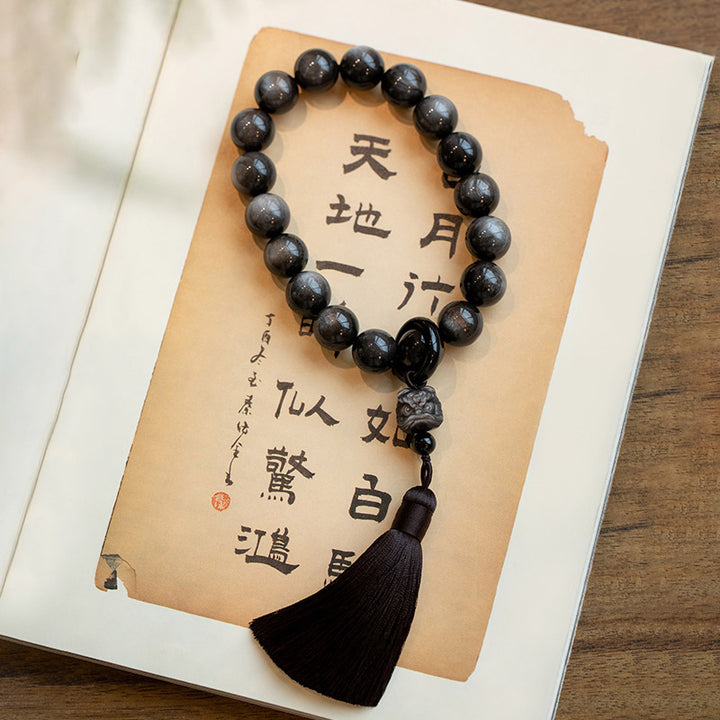 Buddha Stones Argento naturale Ossidiana lucida Ossidiana nera Leone Mala da polso Protezione Nappe Mala tascabile Decorazione per auto