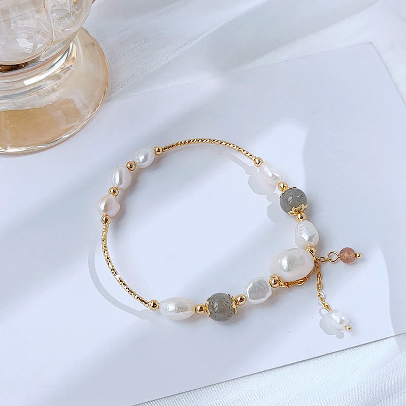 Braccialetto ottimismo con perle di quarzo fragola, pietra di luna e Buddha Stones