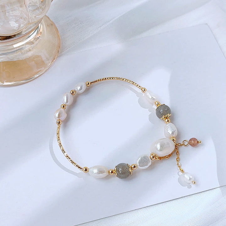 Braccialetto ottimismo con perle di quarzo fragola, pietra di luna e Buddha Stones
