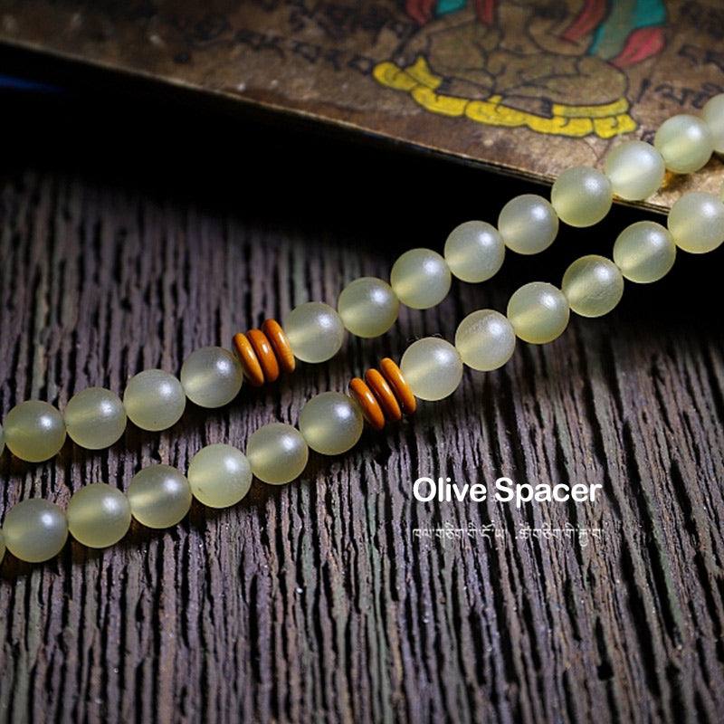 Braccialetto della fortuna in ambra e corno di pecora del Tibet con 108 perle di Mala Buddha Stones