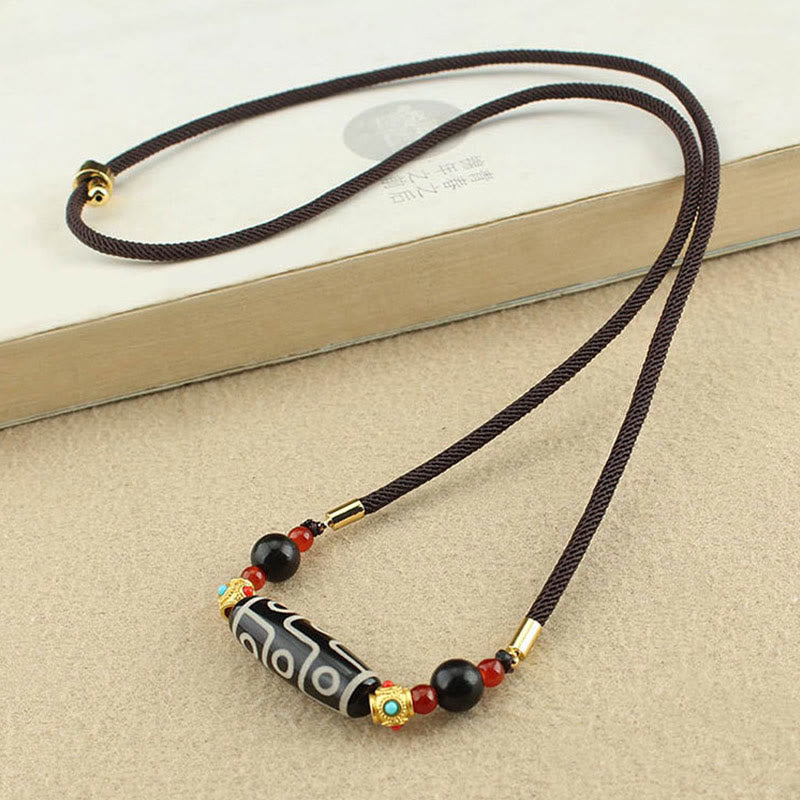 Buddha Stones Tibetano Nove Occhi Dzi Bead Protezione Benedizioni Collana Pendente
