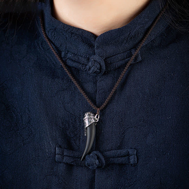 Collana con ciondolo in argento sterling 925 con motivo a denti di lupo e ossidiana nera e forza
