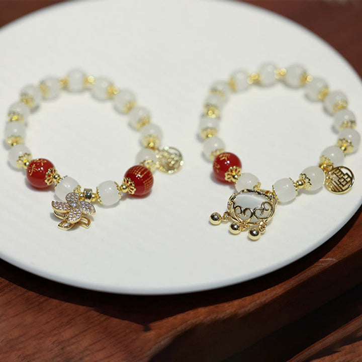 Braccialetto di benedizione con ciondolo a forma di lucchetto cinese con mulino a vento Buddha Stones Fu Character