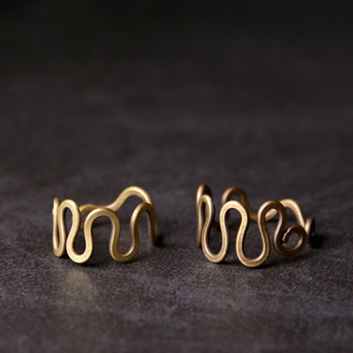 Anello regolabile in rame con design curvo in ottone semplice Buddha Stones, fortuna e ricchezza