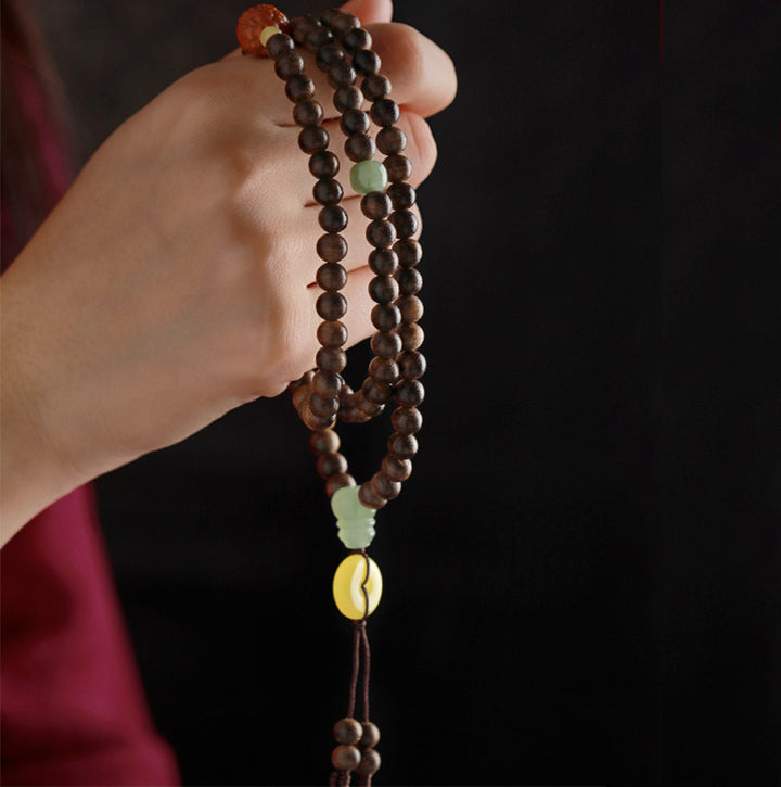 Buddha Stones 108 perle di Mala Kalimantan Agarwood Zucca Giada Ambra Bracciale equilibrio