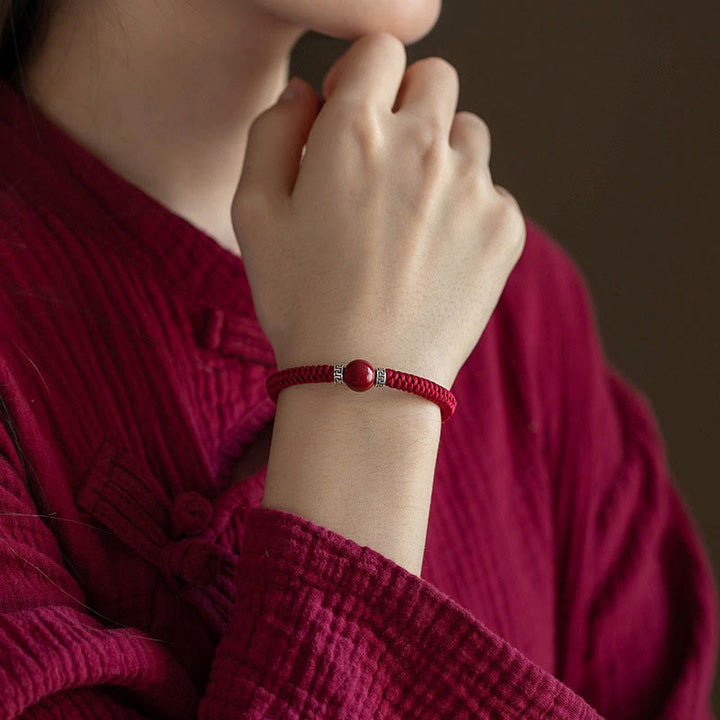 Braccialetto in corda intrecciata fatto a mano con perline di cinabro naturale in argento sterling 925 Buddha Stones