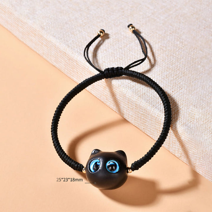 Bracciale intrecciato con motivo a testa di gatto in legno di ebano Buddha Stones, nodo di King Kong della pace - image 21