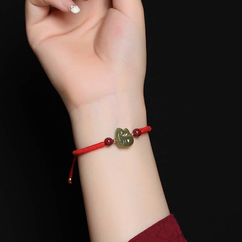 Braccialetto di corda dell'abbondanza di perline di cinabro con coniglietto di giada di Hetian dell'anno del coniglio