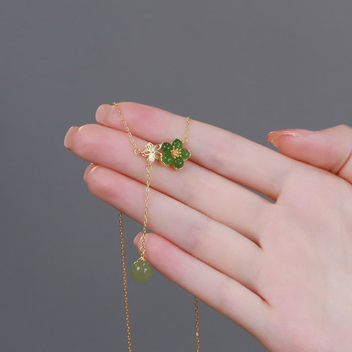 Collana con ciondolo portafortuna in argento sterling 925 con fiore di prugna in giada ciano Hetian, motivo Buddha Stones