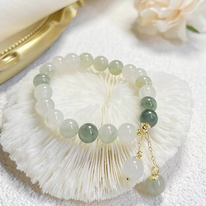 Braccialetto con ciondolo a forma di perlina di fortuna con abbondanza di giada sfumata naturale Buddha Stones