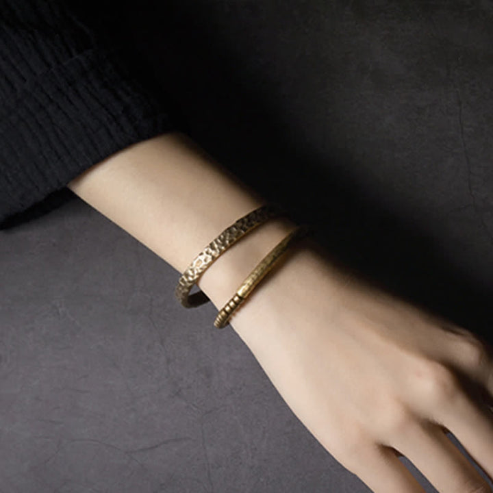 Bracciale rigido con polsino in pietra lavica e rame Balance