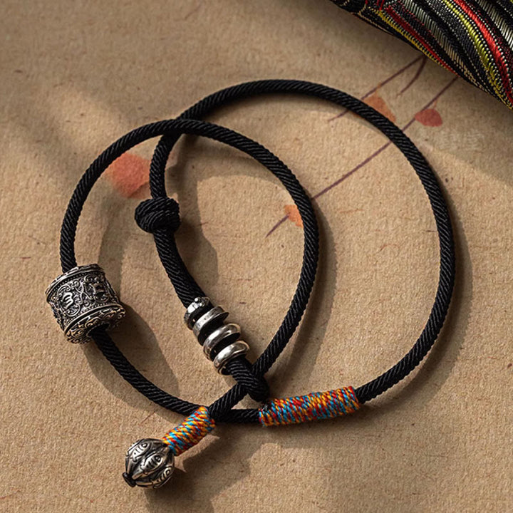 Braccialetto a doppio giro con amuleto intagliato in Buddha Stones tibetano Om Mani Padme Hum