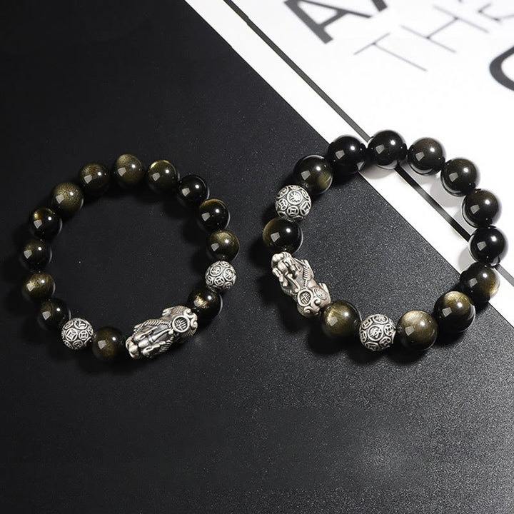 Braccialetto di protezione della ricchezza PiXiu in ossidiana naturale lucidata in argento sterling 925 Buddha Stones