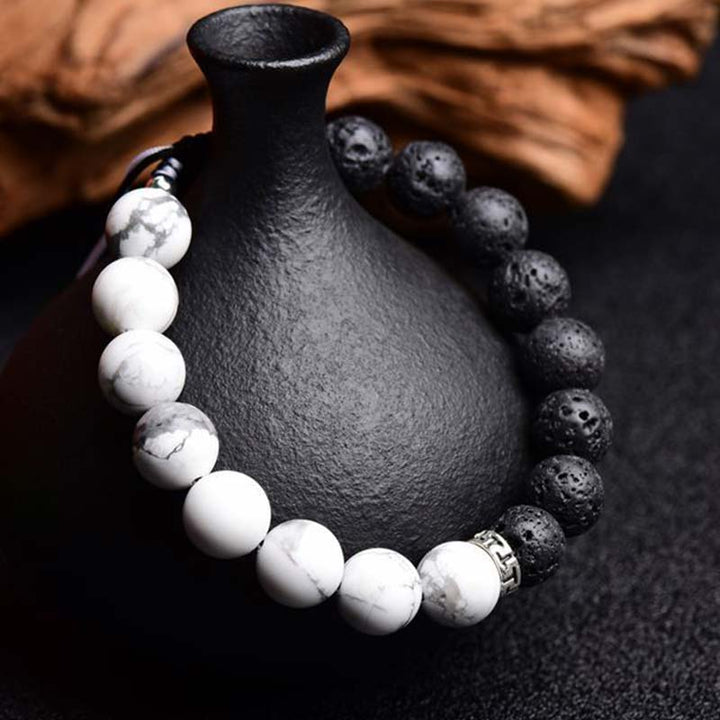 Braccialetto di protezione in pietra lavica Yin Yang Buddha Stones - image 2