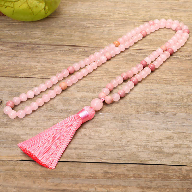 Braccialetto con nappa di cristallo rosa e 108 perle di Mala Buddha Stones