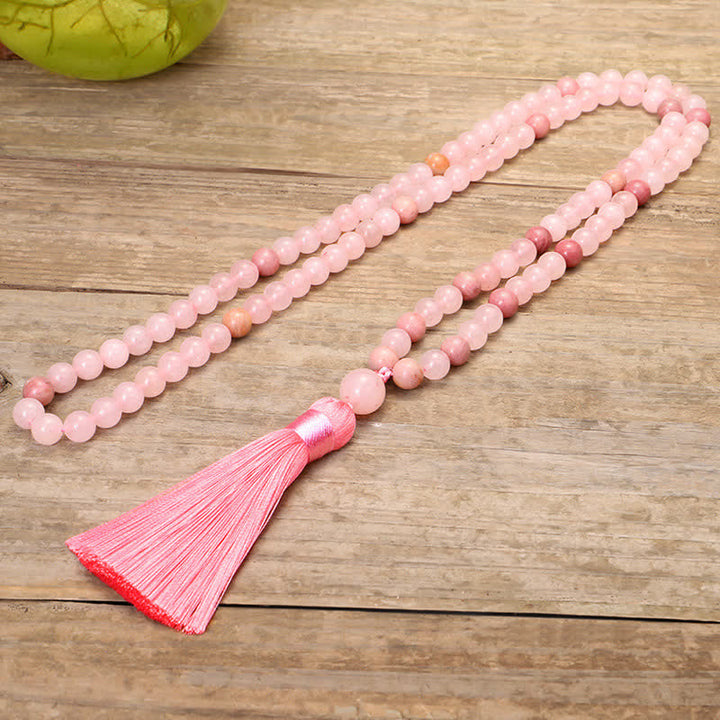 Braccialetto con nappa di cristallo rosa e 108 perle di Mala Buddha Stones