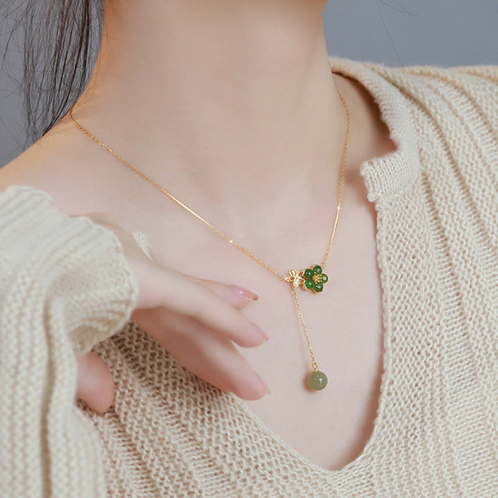 Collana con ciondolo portafortuna in argento sterling 925 con fiore di prugna in giada ciano Hetian, motivo Buddha Stones
