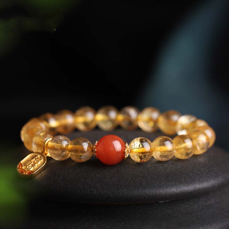 Braccialetto con ciondolo della fortuna in agata rossa e citrino Buddha Stones