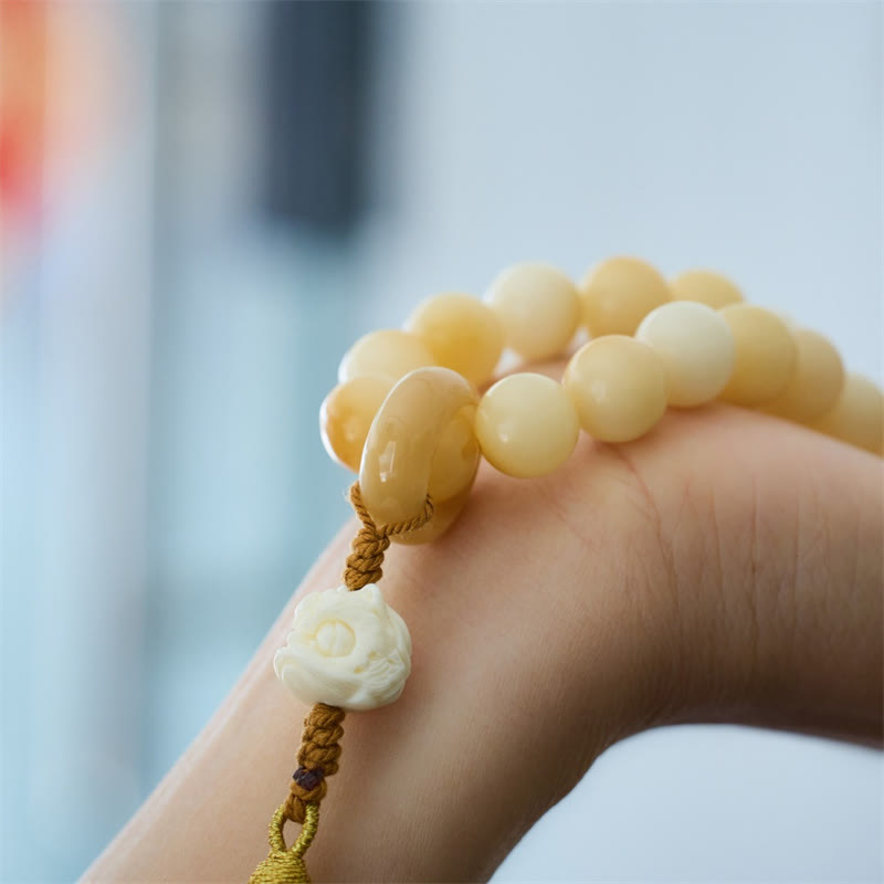 Buddha Stones Semi di Bodhi naturali Avorio Frutta Leone danzante Ciondolo Armonia Nappa Polso Mala