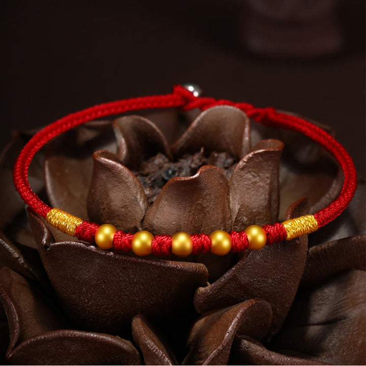 Braccialetto di protezione intrecciato fatto a mano con nodo King Kong, perline d'oro 999 Buddha Stones