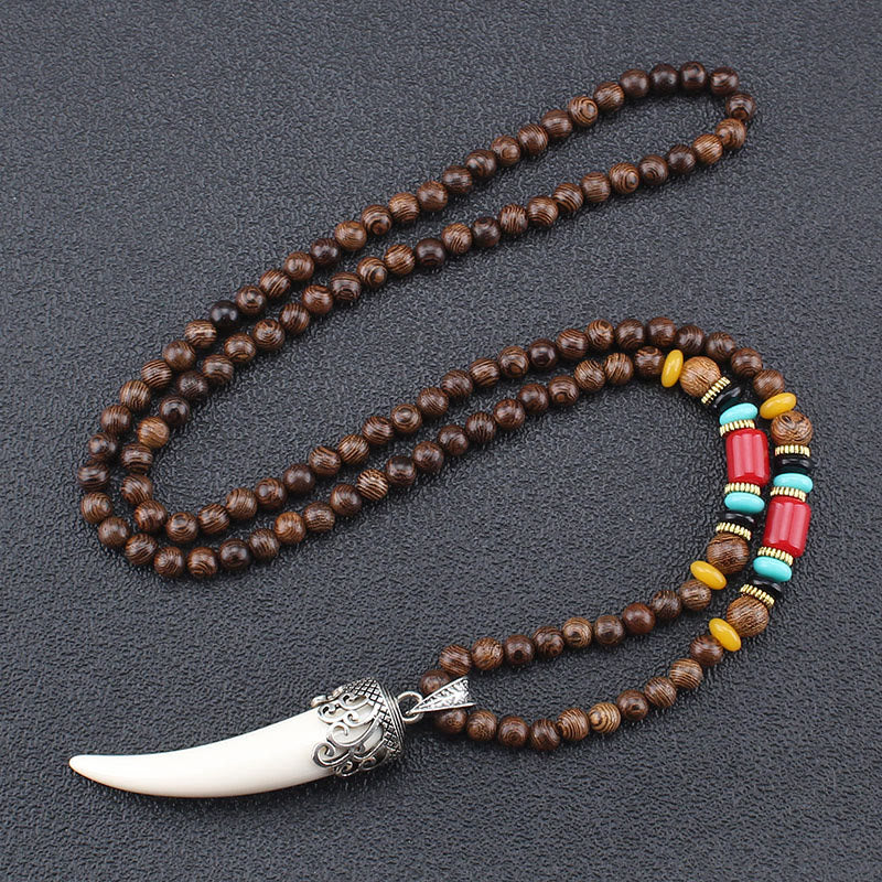 Collana con ciondolo in stile corno in pietra turchese e legno wenge, protezione e meditazione
