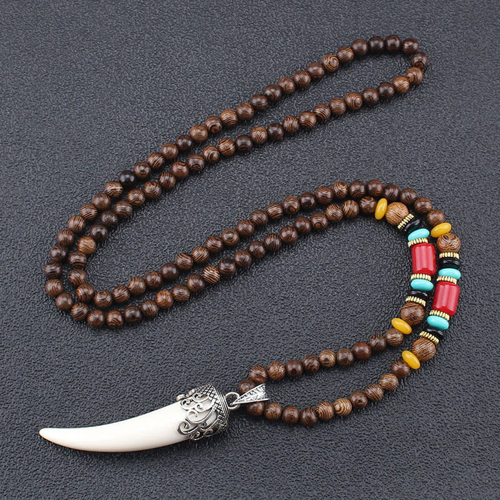 Collana con ciondolo in stile corno in pietra turchese e legno wenge, protezione e meditazione