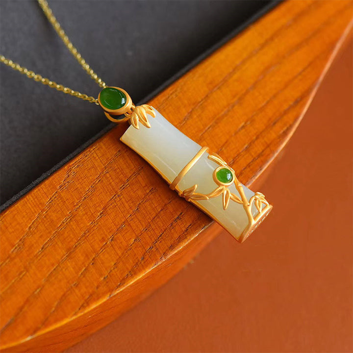 Collana con ciondolo di protezione in giada bianca e giada ciano con Buddha Stones e bambù