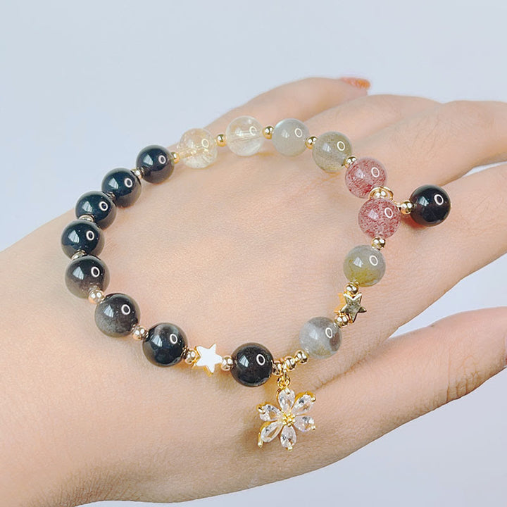 Braccialetto di protezione con cuore, stella e fiore in ossidiana naturale con Buddha Stones argento lucido