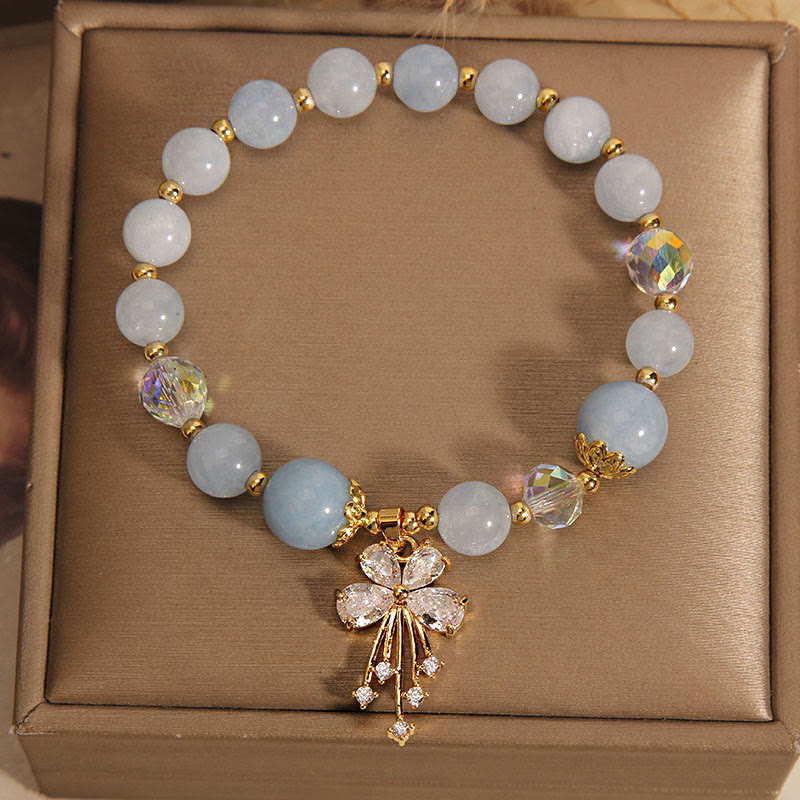 Braccialetto con ciondolo a farfalla in zircone con cristalli rosa e acquamarina Buddha Stones