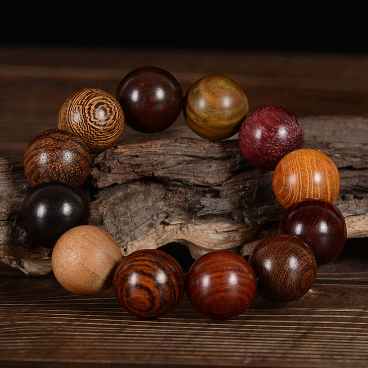 Braccialetto di guarigione di protezione multicolore in legno di sandalo Buddha Stones