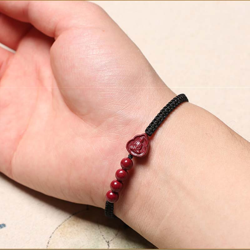 Bracciale con cordino di benedizione Buddha Stones che ride Buddha Avalokitesvara cinabro