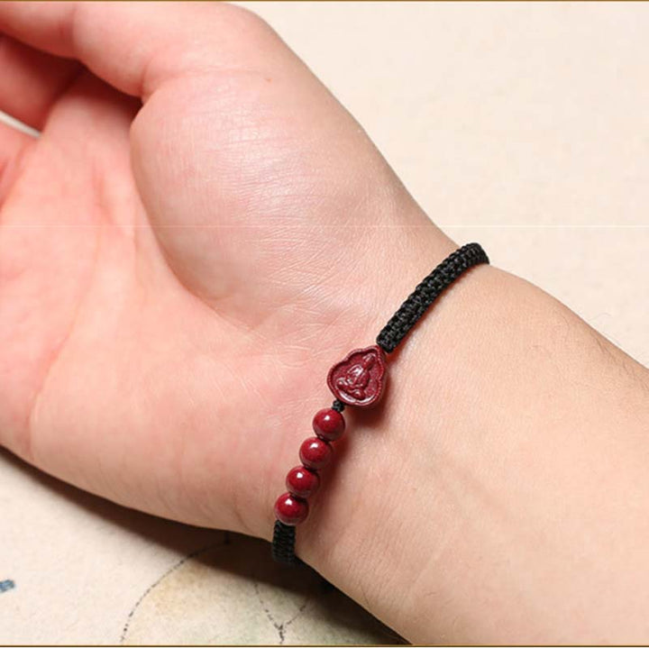 Bracciale con cordino di benedizione Buddha Stones che ride Buddha Avalokitesvara cinabro