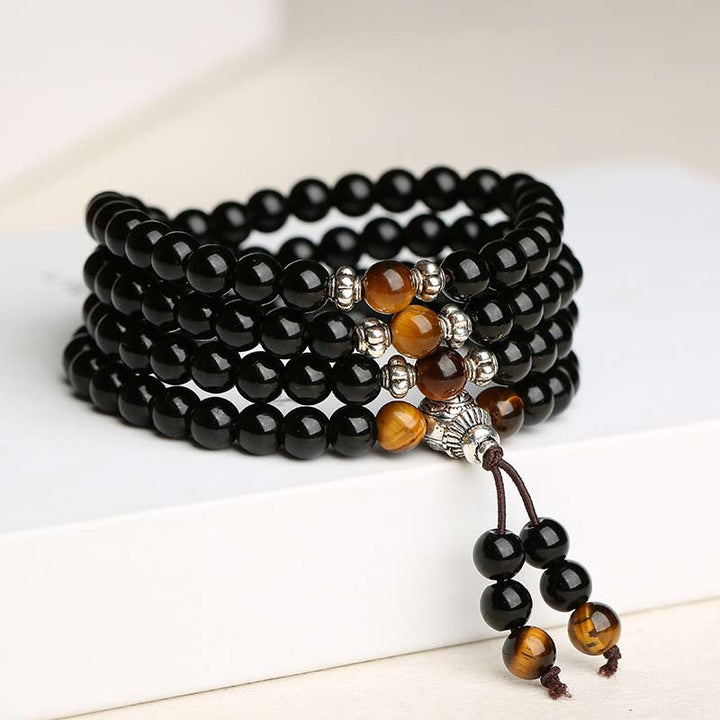 Bracciale Mala di benedizione con occhio di tigre e ossidiana nera Buddha Stones
