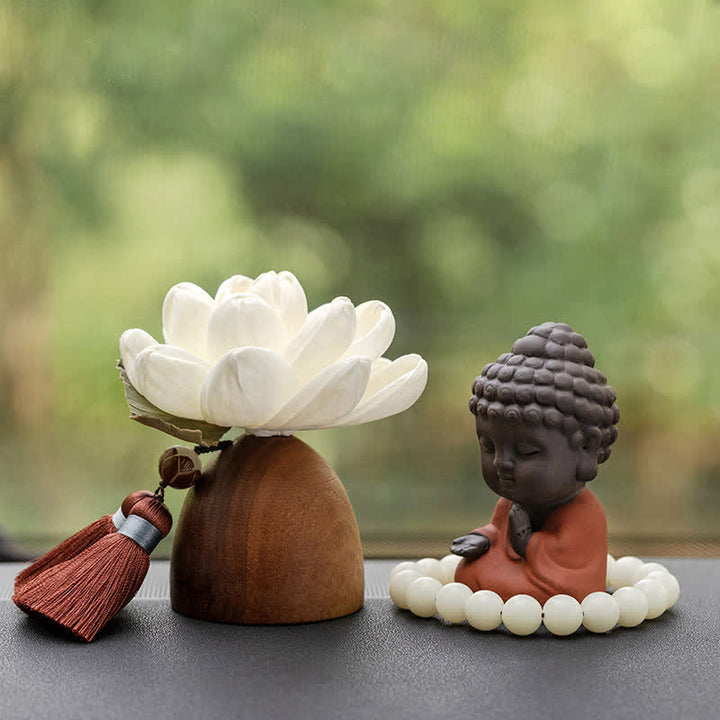 Decorazione di cura calma con fiore di Buddha in legno di pesca nera