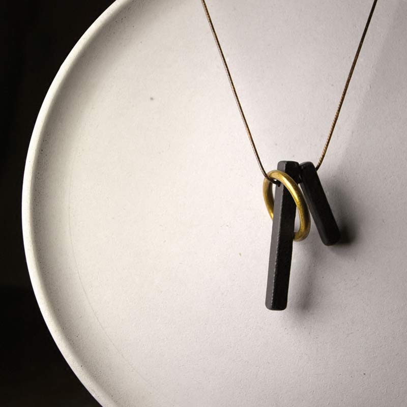 Collana con ciondolo in legno di ebano e cerchio zen Buddha Stones , illuminazione