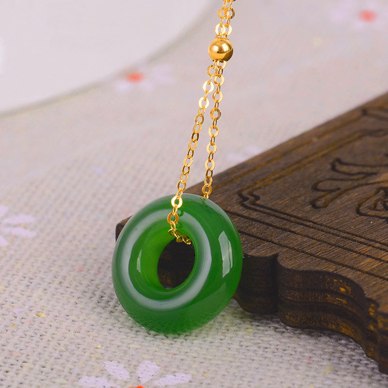 Collana con ciondolo in oro 14K con giada ciano rotonda e guarigione