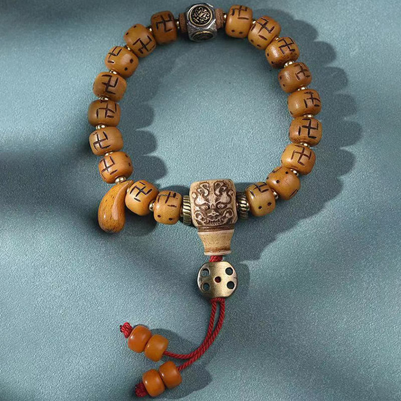 Buddha Stones naturale tibetano osso di cammello svastica Dzi perlina Shankha Buddha fascino Kirtimukha braccialetto con nappa protezione fortuna