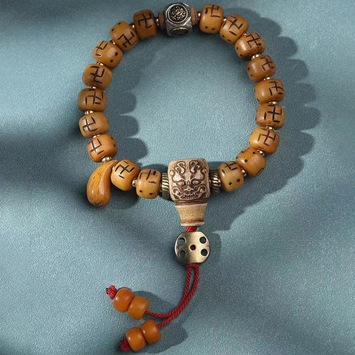 Buddha Stones naturale tibetano osso di cammello svastica Dzi perlina Shankha Buddha fascino Kirtimukha braccialetto con nappa protezione fortuna