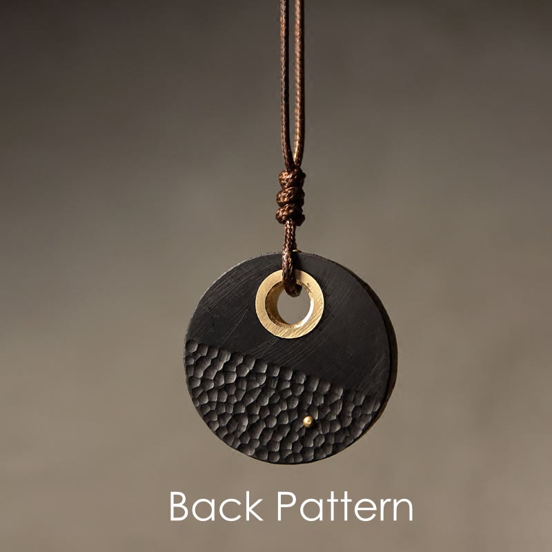 Collana con ciondolo in legno di ebano e rame, realizzata a mano , Buddha Stones, simbolo della pace