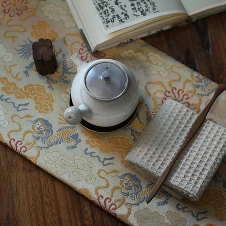 Elegante sottobicchiere per tazza da tè con motivo broccato floreale