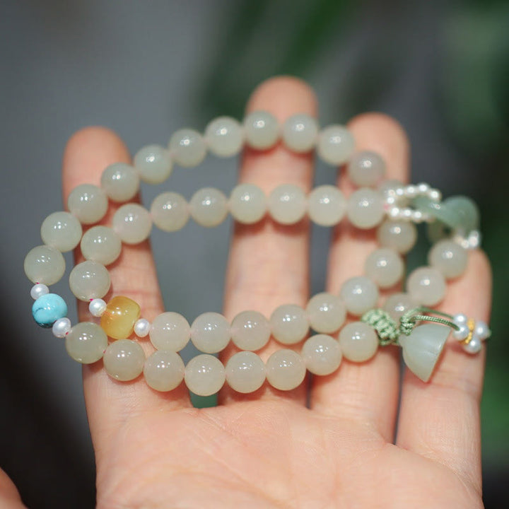 Braccialetto a doppio giro con fibbia della pace in giada Hetian in argento sterling 925 Buddha Stones Lotus Luck