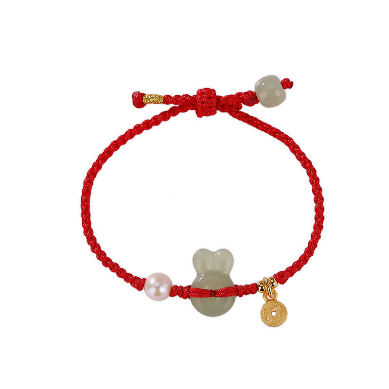 Braccialetto in corda rossa con moneta di rame e giada di Hetian dell'anno del coniglio in argento sterling 925