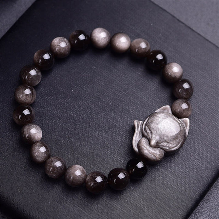 Braccialetto di protezione in ossidiana naturale con Buddha Stones argento lucido