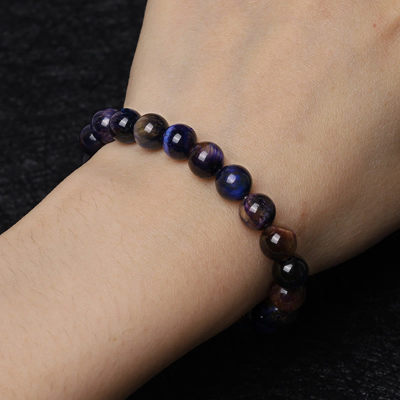 Braccialetto di protezione naturale con occhio di tigre viola Buddha Stones