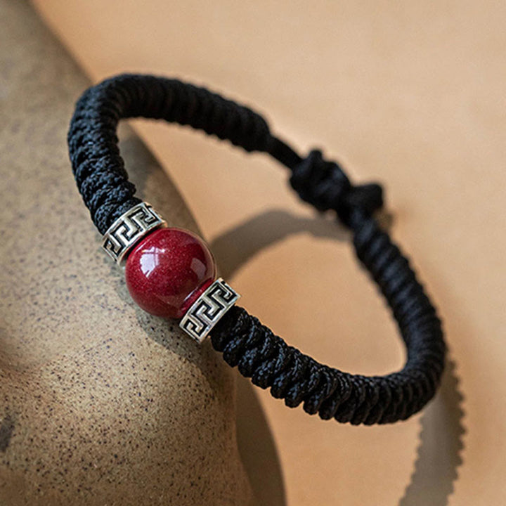 Braccialetto in corda intrecciata fatto a mano con perline di cinabro naturale in argento sterling 925 Buddha Stones