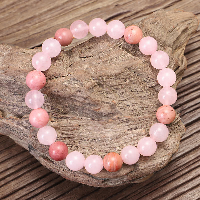 Braccialetto con nappa di cristallo rosa e 108 perle di Mala Buddha Stones