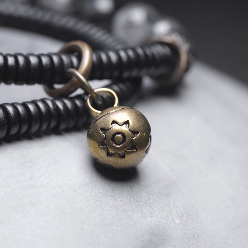Braccialetto di coppia della saggezza del rame del legno di ebano del quarzo rutilato nero Buddha Stones